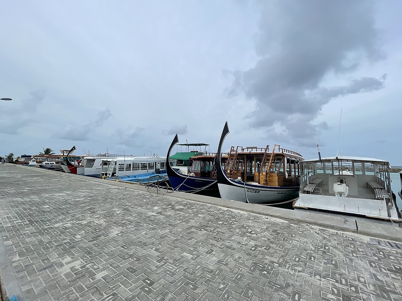The harbour and port area of Dhangethi Island, Maldives, a local gathering spot for sunset views