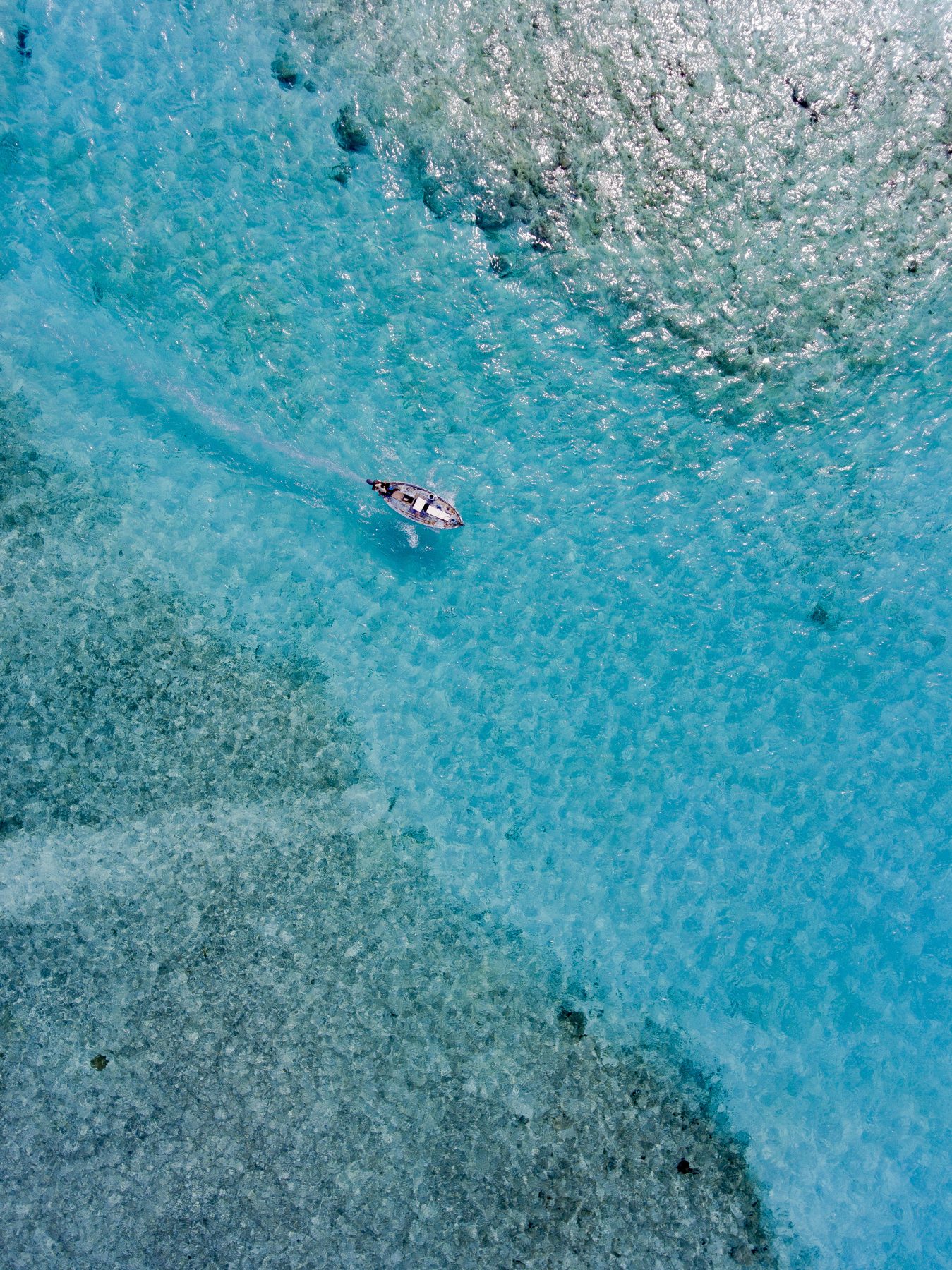Aerial drone photo of Maafushi Island, Maldives, taken from above the lagoon