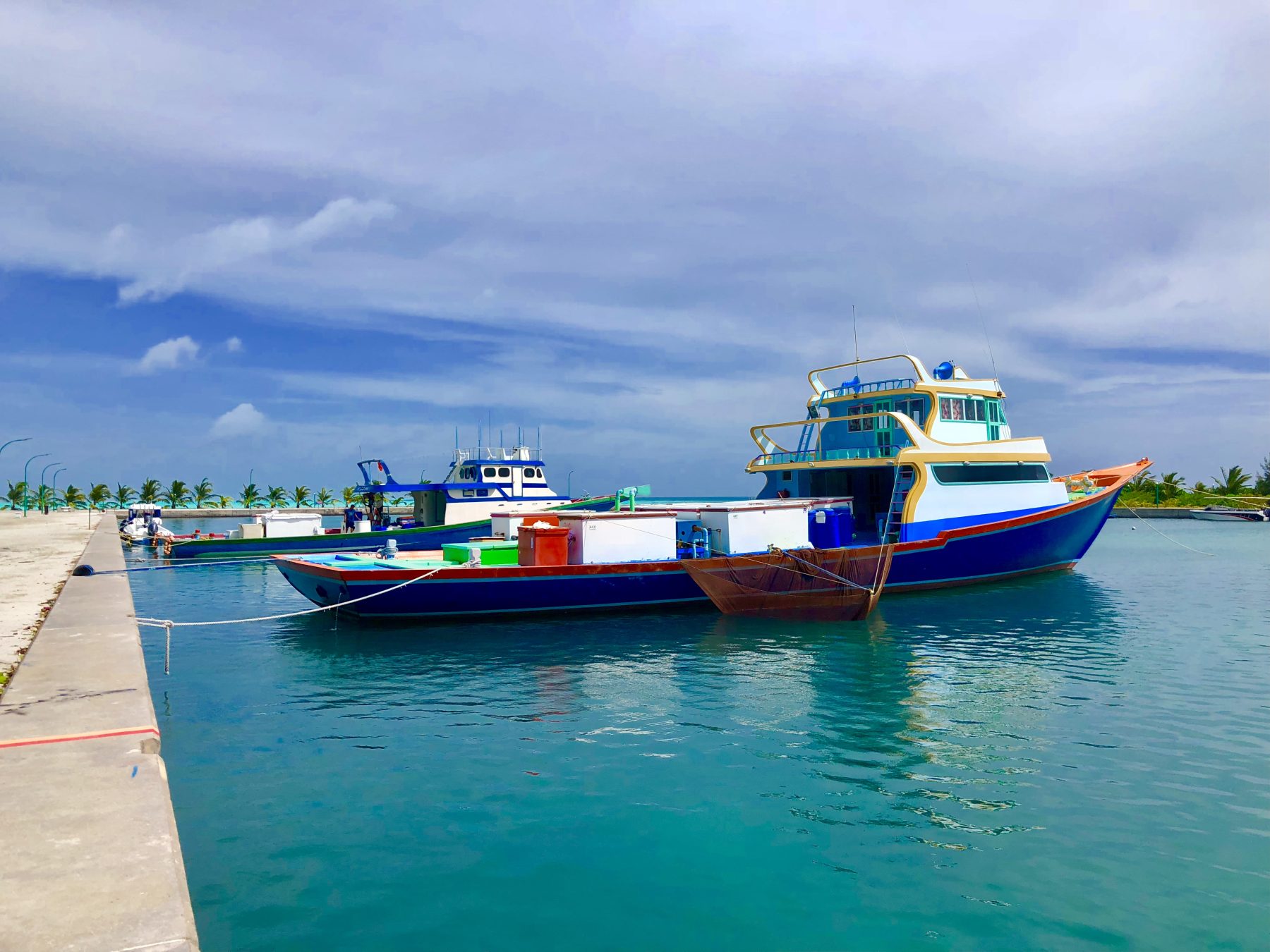 Fishing boats moored at the harbour on Mathiveri Island, North Ari (Alif Alif) Atoll, Maldives