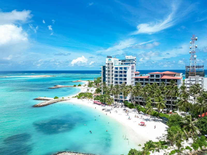 Maafushi Maldives travel guide showing turquoise lagoon and Bikini Beach